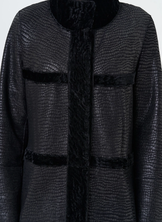 Женская двухсторонняя дубленка черного цвета